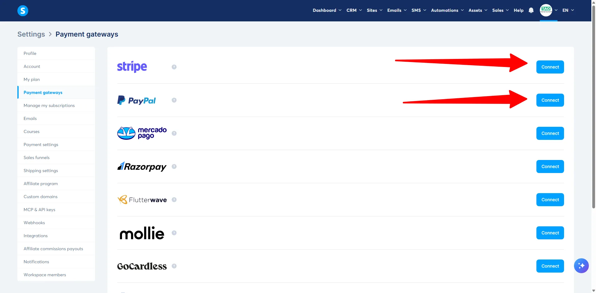 The Payment gateways screen in systeme.io settings, with red arrows pointing at the Connect buttons for Stripe and PayPal.